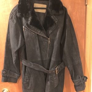 Black suede jacket with faux fur collar belted at waist mid thigh length.